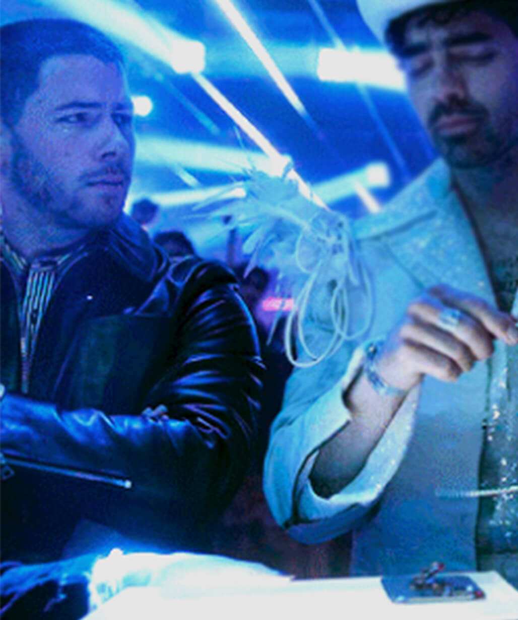 A Very Jonas Christmas Movie 2025 Nick Jonas Black Leather Jacket